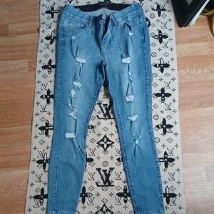 Women's Distressed Blue Jeans